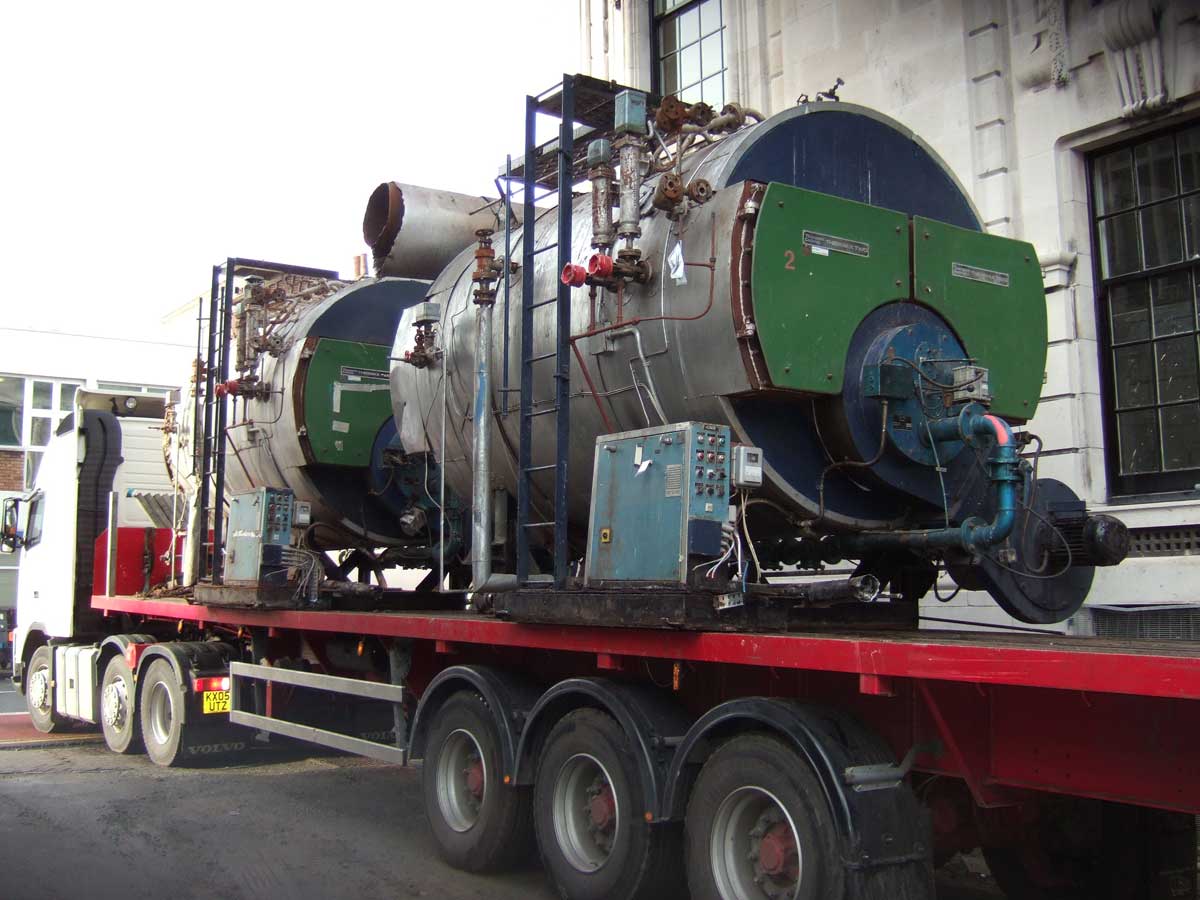 Loading industrial boiler sections onto transport vehicle